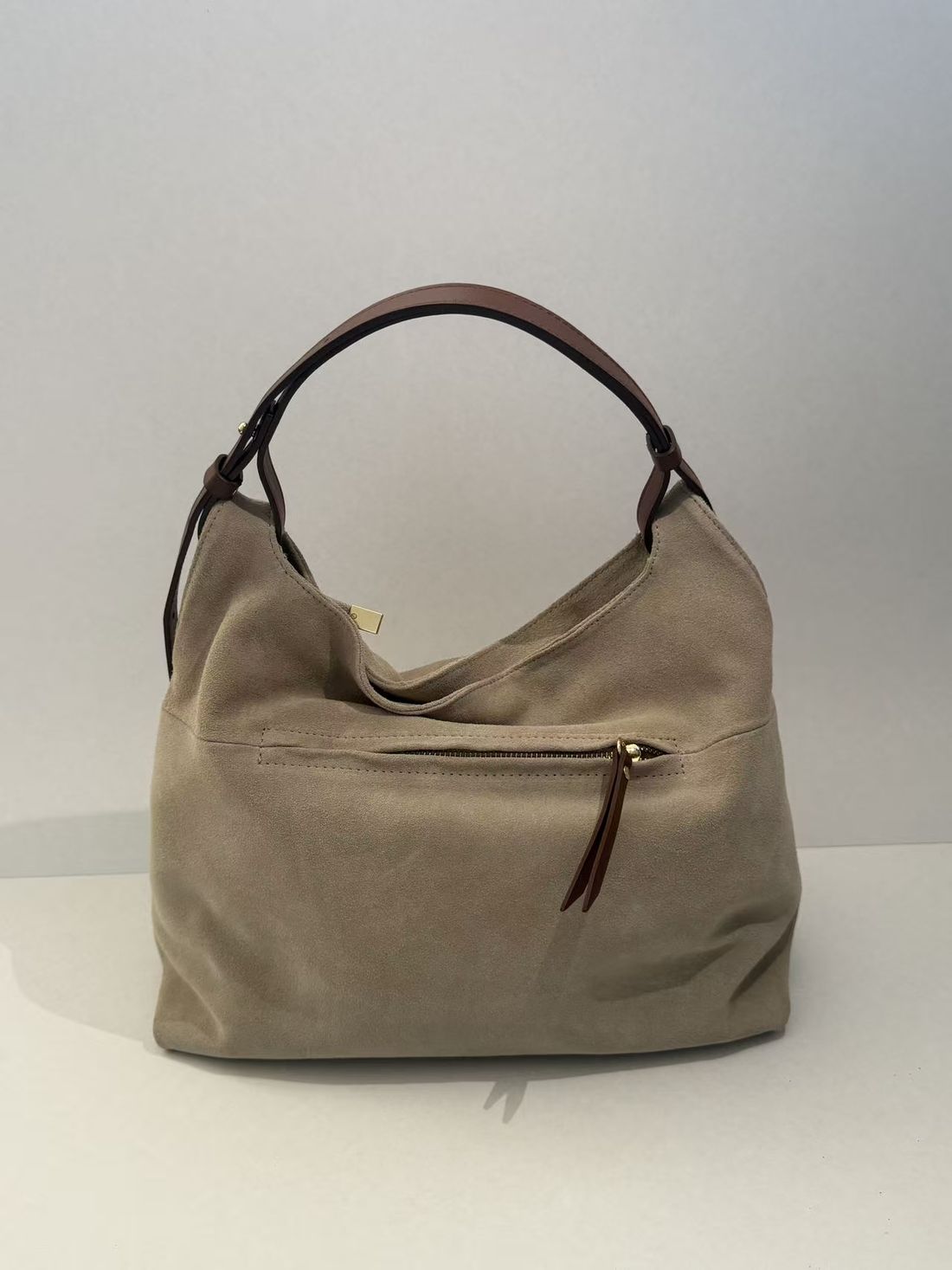 Suede hobo — soft, unstructured shoulder bag